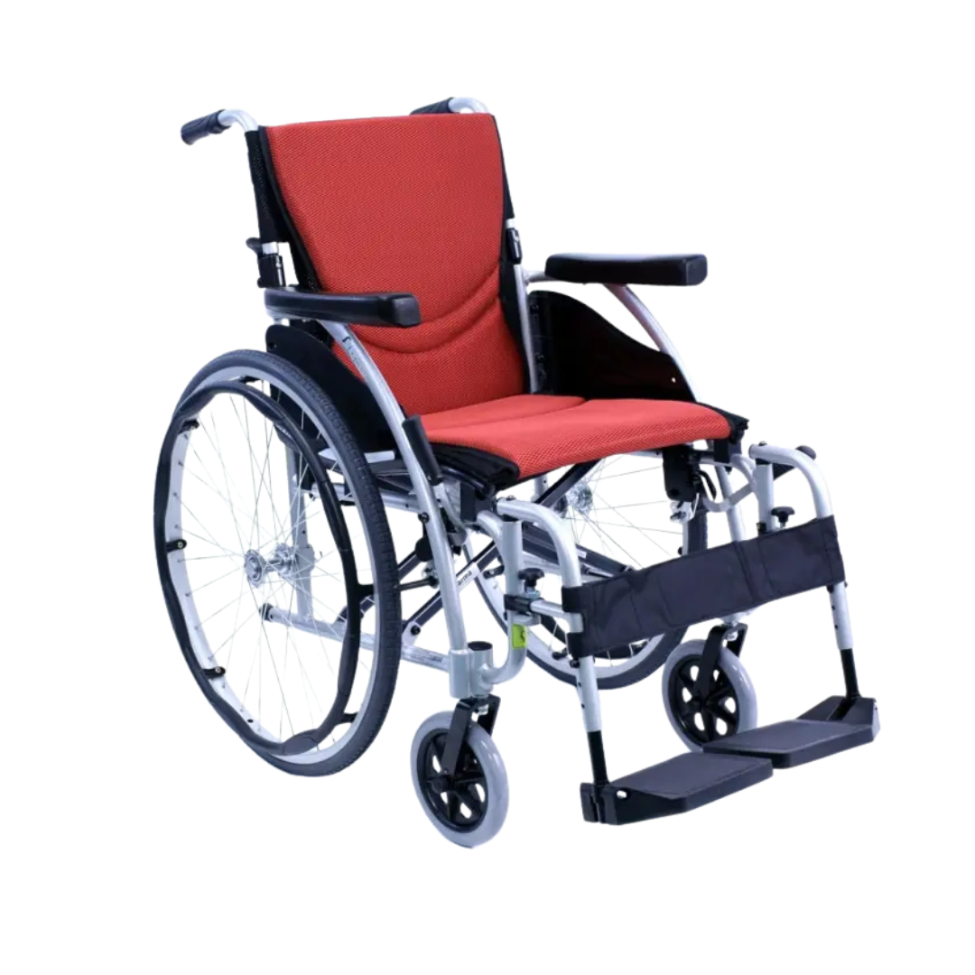 The Karman S-Ergo 125 Ergonomic Lightweight Wheelchair in red and black features an ultra-light design, large rear wheels, smaller front ones, S-shape ergonomic seating with a cushioned seat, armrests, adjustable footrests, and a silver metal frame against a white background.